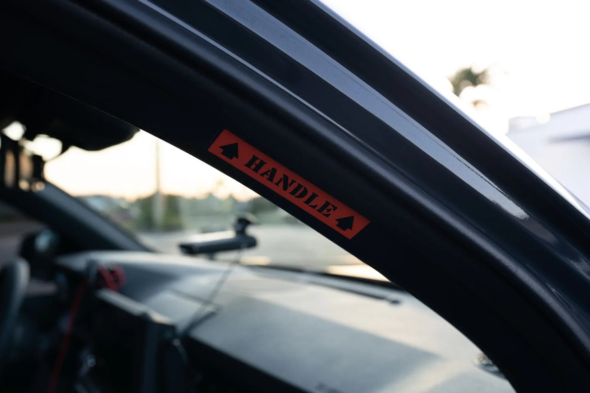 Passenger Side Grab Handle Warning Label - 2024+ Tacoma / 2025+ 4Runner
