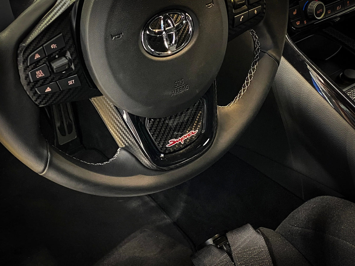 Real Carbon "Supra" Steering Wheel Trim Overlay (Lower) - 2020+ Supra